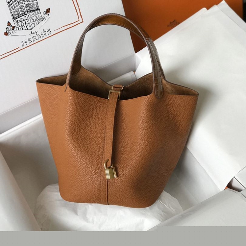 H**mes shopping bags